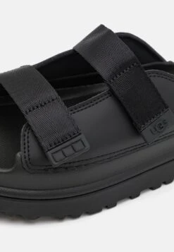 Ugg GOLDENGLOW SLIDE UNISEX - Slippers - Black 15 Ugg GOLDENGLOW SLIDE UNISEX - Slippers - Black -Trade INN 8c34d726101f4f21b375b3e27ff3f59e
