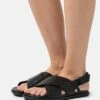 Ugg Solivan Slingback - Sandals - Black
